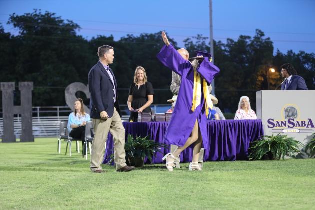 Senior Haleigh Ware celebrates after getting diploma | Photo by Kayti Lackey