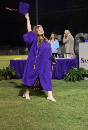 Andrianna Tucker-Fritz gives one final wave as she exits the field | Photo by Kayti Lackey... More graduation photos can be seen on Facebook at 1916Athletics.