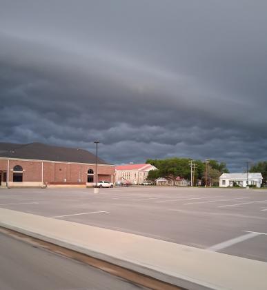 6-10-25 - storm front coming in just over the San Saba's First Baptist Church and First Methodist Church