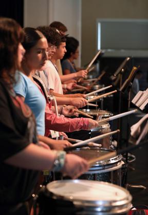 Students in HPU’s 51st Band Leadership Camp practice percussion in Mims Auditorium.