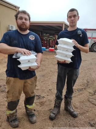 first responders receive meals from volunteers