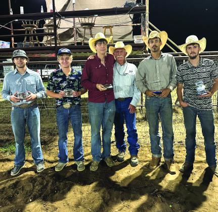 Wild Horse Race Winners are Dalton Moats, Evan Deeds, and Dallas Evans and are pictured with judge Frank Pearce and second place Garrett Brown and Hagen Perkins.