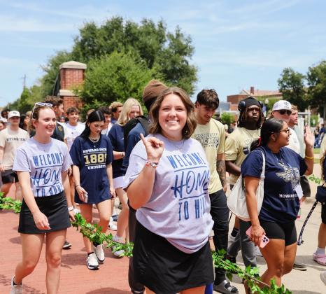 Students participate in the Chime In tradition.