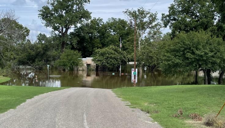 This Old Mill House is on a hill. The water surrounding it is a lot deeper than it looks! | Photo courtesy of Debbie Shahan