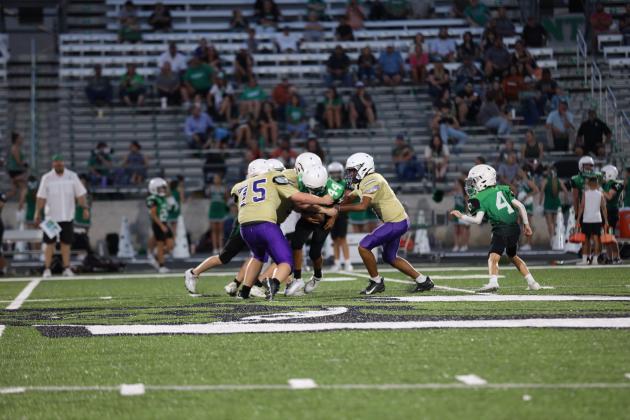 Dillo defense #75 Silver Walts and #11 Rome Hatten stop Burnet runner last Thursday, September 18th.