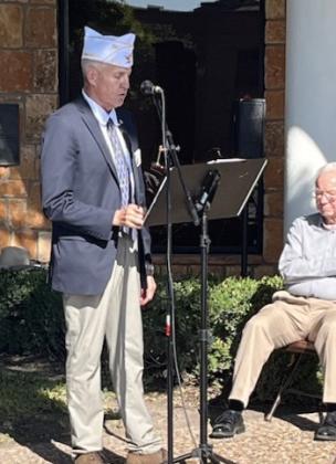 Texas Department Commander Richard Huntley provided remarks about the origins of the American Legion. He would later present a $10,000 check to the post to assist in flood relief. Also in photo (right) is Jerry Blankenship, President of the San Saba County Historical Commission.
