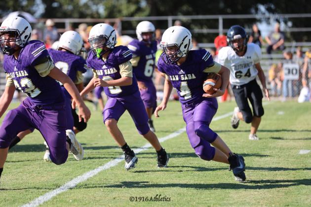 #4 Rexton Hunt follows lead blocker #22 Bobby Verette in last Thursdays game against Goldthwaite