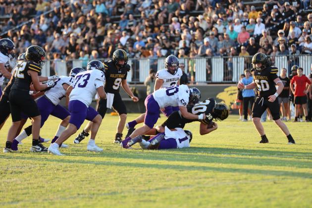 #50 Kolton Pierce with the help of #1Luke Tharp make a major stop against Goldthwaite offense in Friday evening's 108th Battle of the River