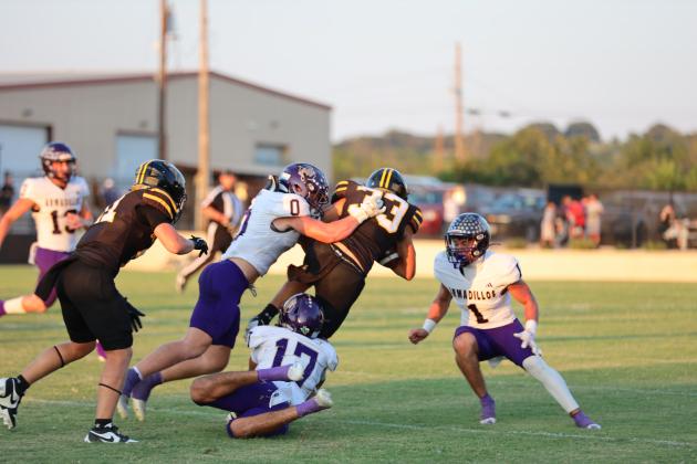 #17 Juan Patino #0 Jason Everett  #1 Luke Tharp stop Goldthwaite runner in last Friday's game