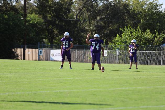 #74 Manuel Ferrer gets ready to kick off for the Armadillos.
