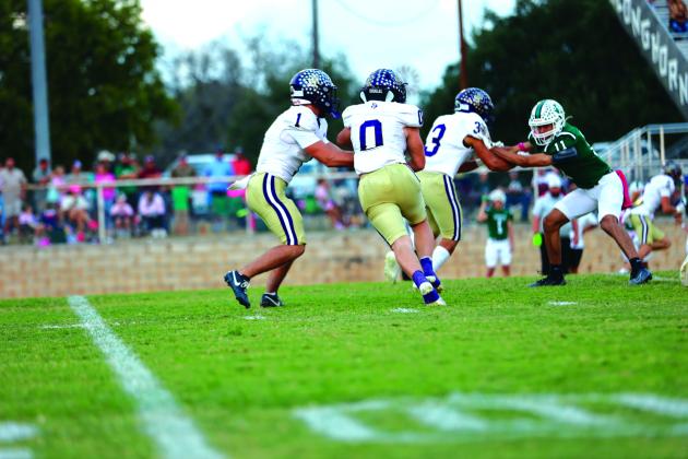 San Saba’s #1 Luke Tharp and #0 Jason Everett, Tharp had 219 rushing yards and 2 touchdowns for the Armadillos, while Everett came in with 112 yards and added 2 touchdowns also.  Photo by Kayti Lackey