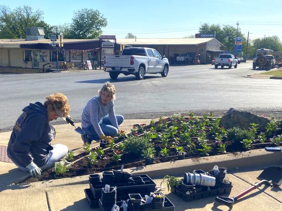 EDC article-planting One ongoing project for KSSB is planting, cleaning, weeding, and maintaining downtown Flowerbeds. Pictured are Debbie Shahan and Kathleen Hawkins. Courtesy of Sarah Saldivar