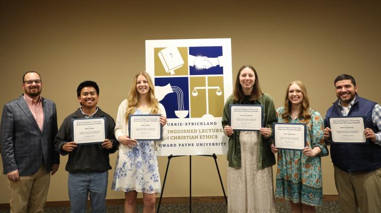 Pictured from left to right with guest speaker John Litzler (left), are Currie-Strickland Scholars Biak Sang, a senior from Garland; Elsa Leake, a senior from Georgetown; Tori Petersheim, a graduate student from Flower Mound; Cate Gramling, a senior from Rowlett; and David Newman, a junior from Brownwood.