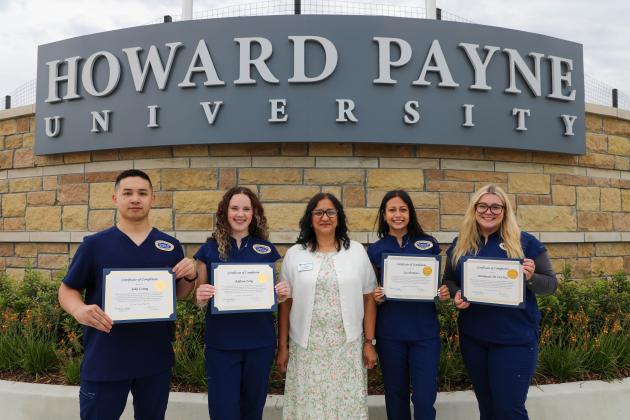 HPU’s first CNA cohort is pictured from left to right: Jake Leung; Addison Long; Martha Treviño-Brunette, university nurse and NATCEP director; Iza Harrison; and Mackenzie De La Cruz.