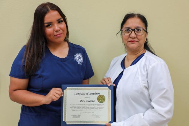 Paris Mederez (left), who was unable to attend the ceremony, is pictured with Martha Treviño-Brunette (right), university nurse and NATCEP director.