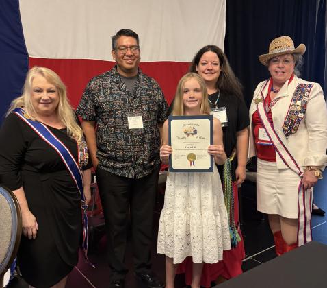 4th-grade student essay winner Faryn Ellis with DRT President General Ora Jane Johnson, Alabama-Coushatta representatives Delvin Johnson &amp; Joy Montgomery and DRT Historian General Carolyn Raney