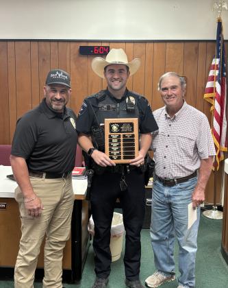 Employee of the Month - Police Officer Jason Gann is pictured here with Chief Stephen Lozano and Alderman Robert Whitten. Courtesy of Scott Glaze