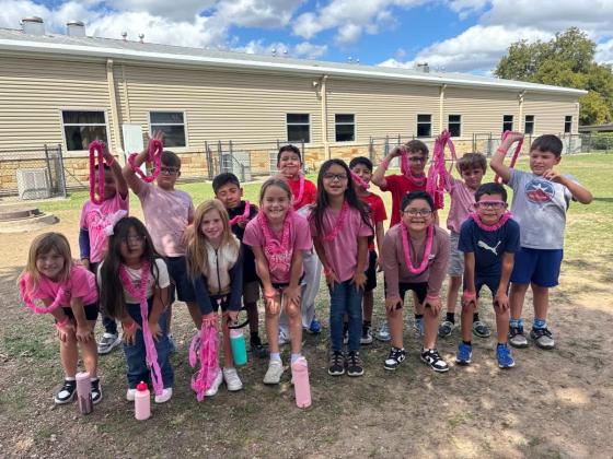 Some SSES 2nd Graders having fun being all decked out in pink!