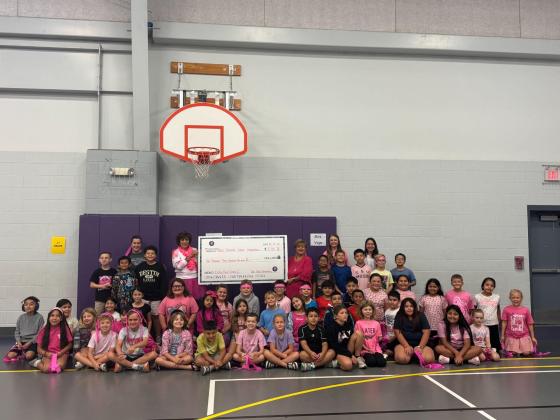 The San Saba Elementary 3rd Grade Students won the contest by collecting $1,213.32 along with Dora Miller and Donna Shahan holding the check for the grand total of $2,223.50.