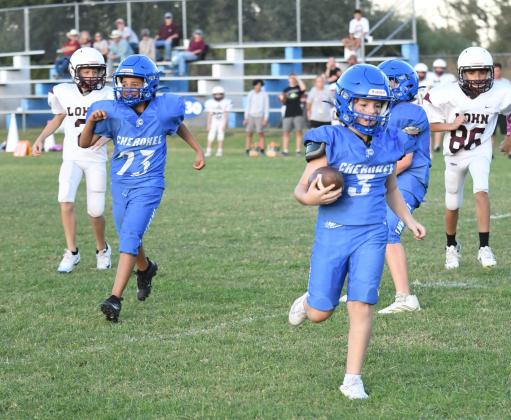 River Wakefield runs in the touchdown as Richard Chavarria celebrates in the junior high game against Lohn Courtesy Valerie Valdez