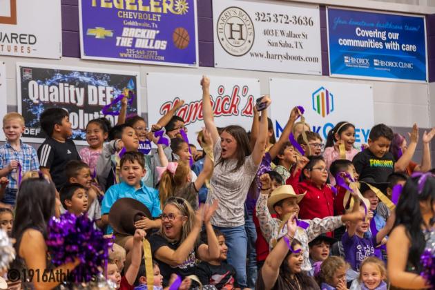 Ms. Pierce - 2nd Grade Teacher, cheering with the kids.