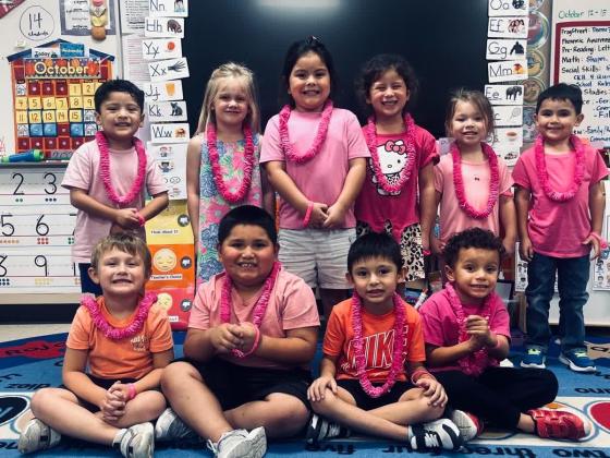 Some SSES PK students enjoying their pink gifts from Donna and Dora!