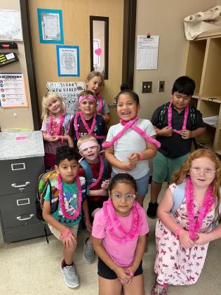 More SSES First Graders celebrating our SS County Cancer Survivors!