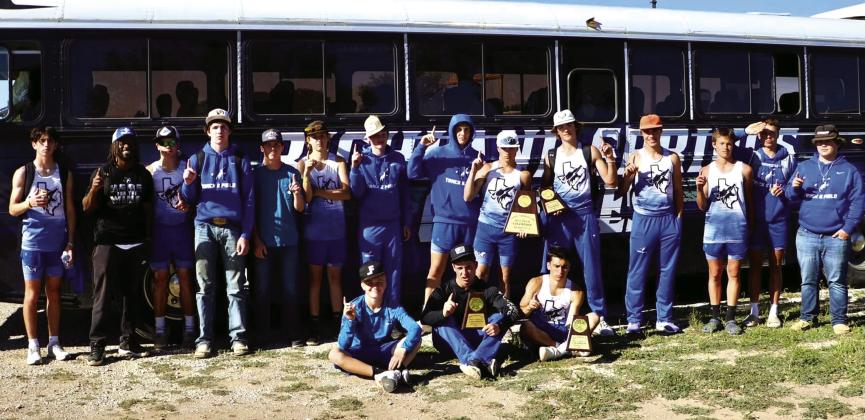 Pictured left to right: Cody Martin, Coach Clutch, Gage Behrens, Daniel Kubin, Clayton Meador, Xander Hoevers, Sirr Beam, Eli Hutchins, Rush Norris, Jim Eckerman, E. Deeds, Layne Ward, Cohen Ethridge, and Josh Meador. Seated: E. Deeds, Billy Perry, and Zeke Hoevers. Courtesy of Sue Ransom