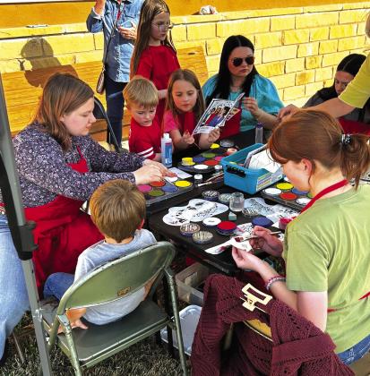 San Saba art students face painting at “The Night at the Museum” Photo by Melissa Devine