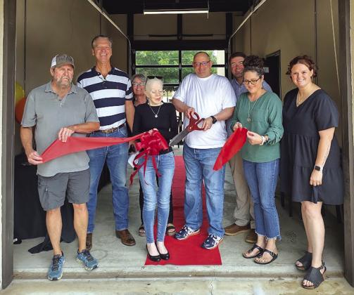 'goodtogo.dev' had their Ribbon Cutting Ceremony Monday, May 20th, at the Visitor's Center. Pictured left to right: Larry Davis, James Hellums, Shelia Meador, Zahra Allibhai, Jason Phillips, Robby Johnson, Angela Johnson, and Chamber of Commerce Director Paige Faught. Photo by Djuana Payton