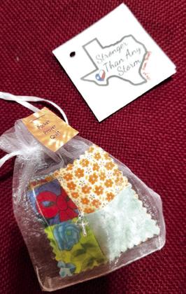 Pocket prayers with special Texas tags remind recipients they are “stronger than the storm.”