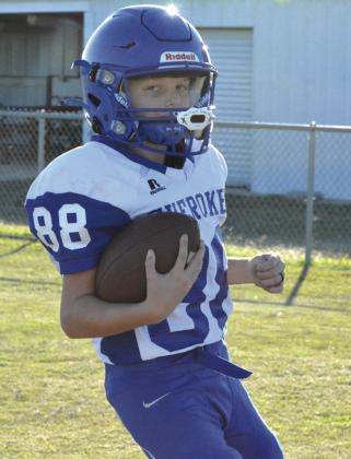 Holdin Boswell looks towards photographer after scoring his first touchdown for the Indians