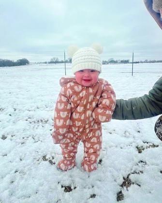  First snow for six-month-old Blakely Roan. Rochelle, Texas - Submitted by Cindy and Mike Barton