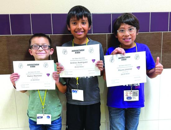 Left to right: 1st grader Mateo Martinez, 4th graders Andres Rodriguez and Mauro Jimenez Courtesy of Becky Olavarria