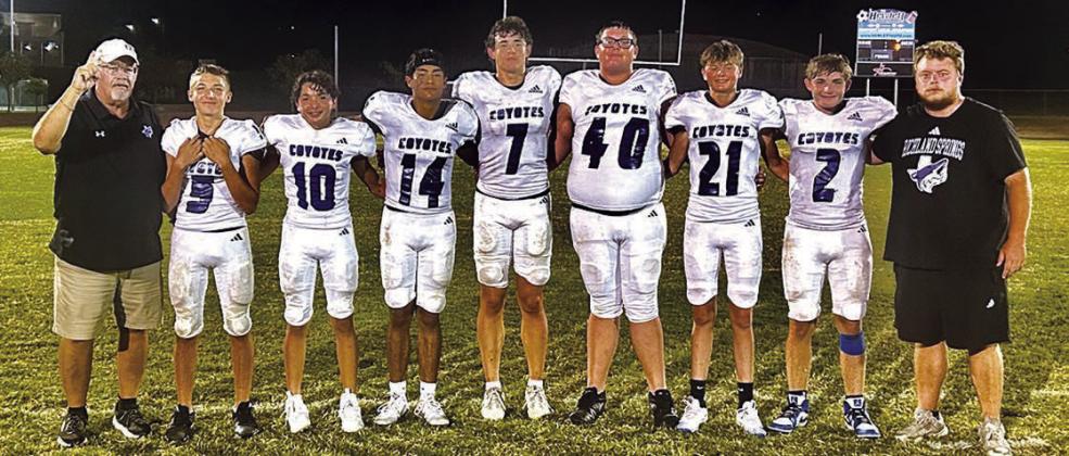 Coach Ethridge, #5 Trendon Vogel, #10 Matthew Woerndell, #14 Ian McKinnerney, #7 Eli Hutchins, #40 Hunter Stewart, #21 Christian Greenwood, #2 Christian McKinnerney, and Coach Watkins Courtesy of Richland Springs Coyote Booster Club