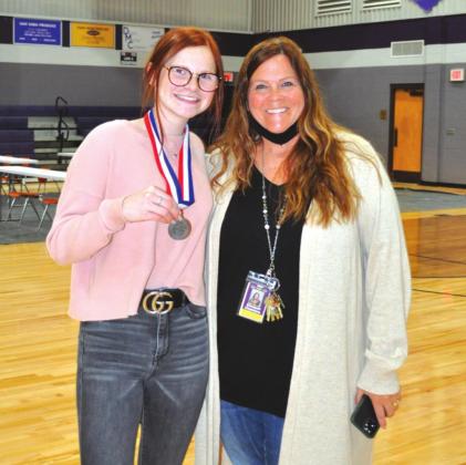 Jaela Nelson with Coach Elizabeth Chambers. Jaela was the SILVER MEDALIST in Lincoln Douglas Debate.