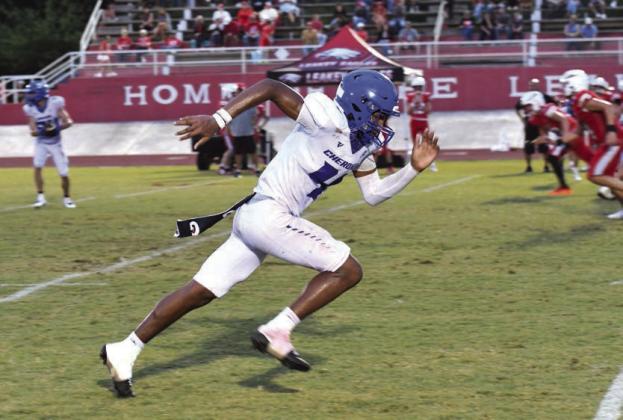 John Irving running the field against Leakey Courtesy Valerie Valdez