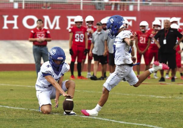 Jaxon White and Weston Woolsey with some teamwork against Leakey Courtesy Valerie Valdez