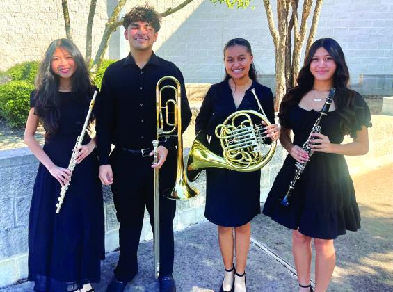 Jessica Nguyen, Jesus Garcia, Evelyn Davila, and Marlane Rodriguez. These San Saba Armadillo Band students made it to state. The group of four musicians have two big things that happened for them: they all made the All-Region Band and they were all named Texas Music Scholars by the Texas Music Educators Association. Courtesy of Chans Moellendorf