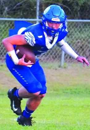 Max Williams is running the ball in the Leakey varsity game. Courtesy Valerie Valdez