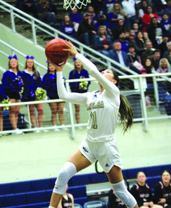 #11 Chassidy Gonzales going up for 2 of her 22 total points for the night.