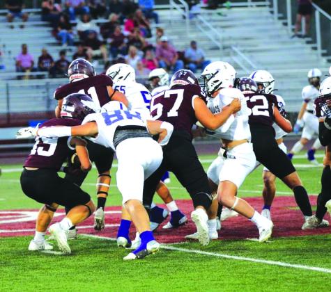 Danny English puts a hit on the Johnson City QB Photo courtesy of Kayti lackey - 1916 athletics