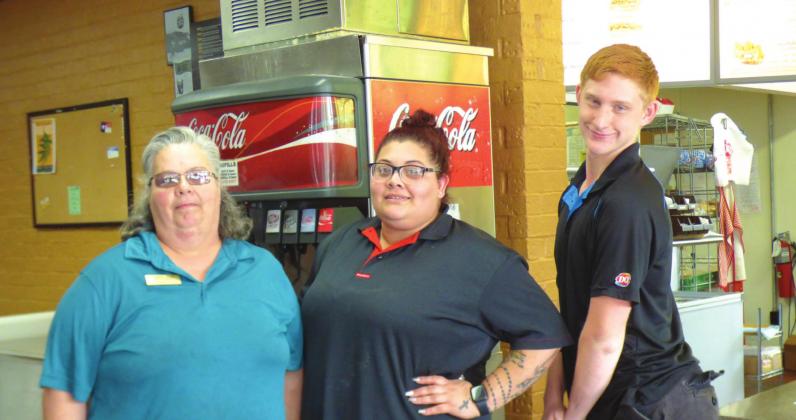 Dairy Queen’s Assistant Manager, Debbie Herd, shift leader, Talisha Moreno, and team member, Levi Brown, are eager to serve the community with Treats and Eats.