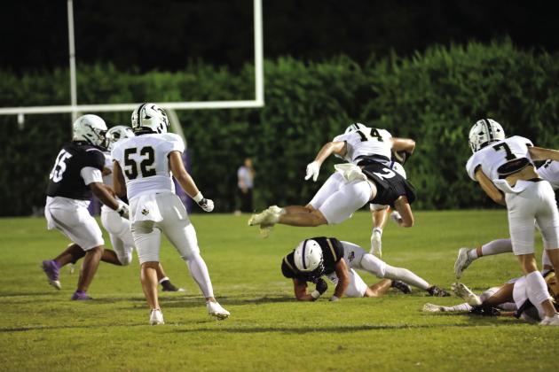 # 2 Graden Lebow making a leaping tackle to stop a Junctions run.