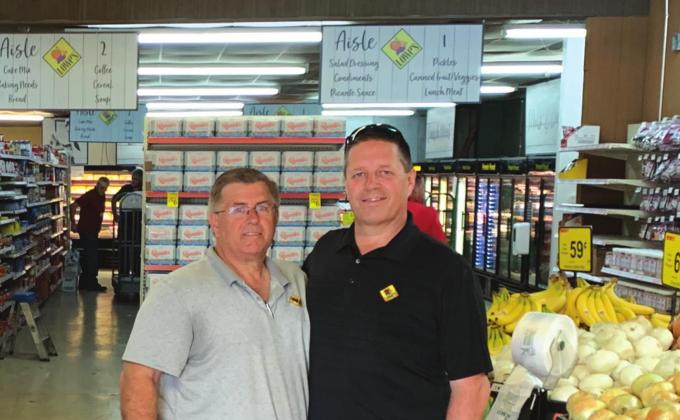 The Albert Stowell building before it was transformed into the current Lowe’s Market. Lowe’s Regional Manager, Alan Buxkemper, left, and Lowe’s director of construction and facilities, Alan Buxkemper.