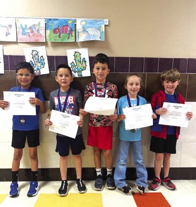 First grade students L-R: Julian Rodriguez, Daniel Estrada, Jett Smith, Lily Pierce, and Reagan Anderson.
