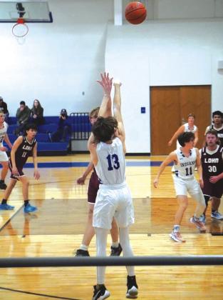 Caleob Houston with a nice follow through in the Varsity game against Lohn. Photo courtesy of Valerie Valdez
