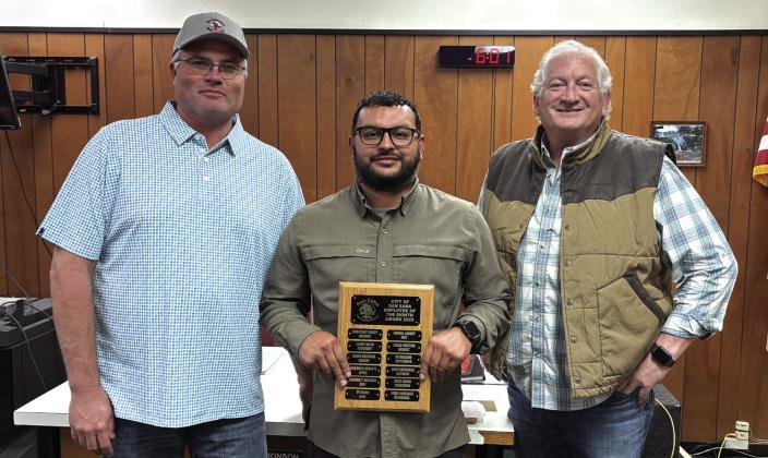 Jesse Gonzalez works for the City of San Saba in the Golf Department, and he was selected as the Employee of the Month for December 2025. Taking part in the presentation of his award was his supervisor Michael Whitley (left) and Alderman Shawn Oliver (right). Congratulations, Jesse!