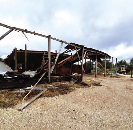 Before the storm, this was a storage facility behind the main building of Riggs Feed and Fertilizer. Photo by Carolyn Preece