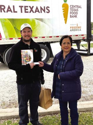 Travis Pope of The Central Texas Food Bank and Elaine Kasprzyk of Hill Country CattleWomen